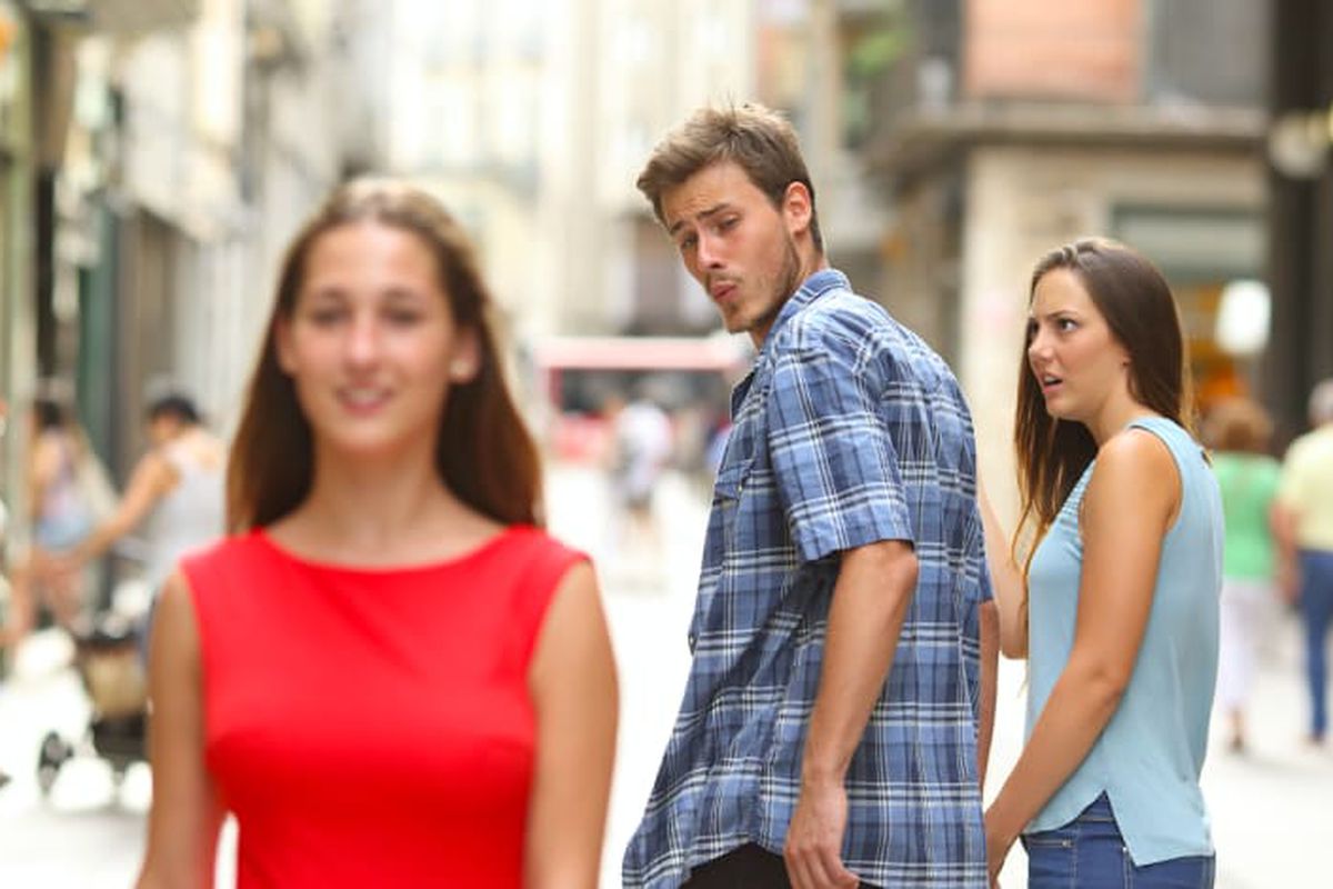 Distracted Boyfriend meme about Magic Scoop