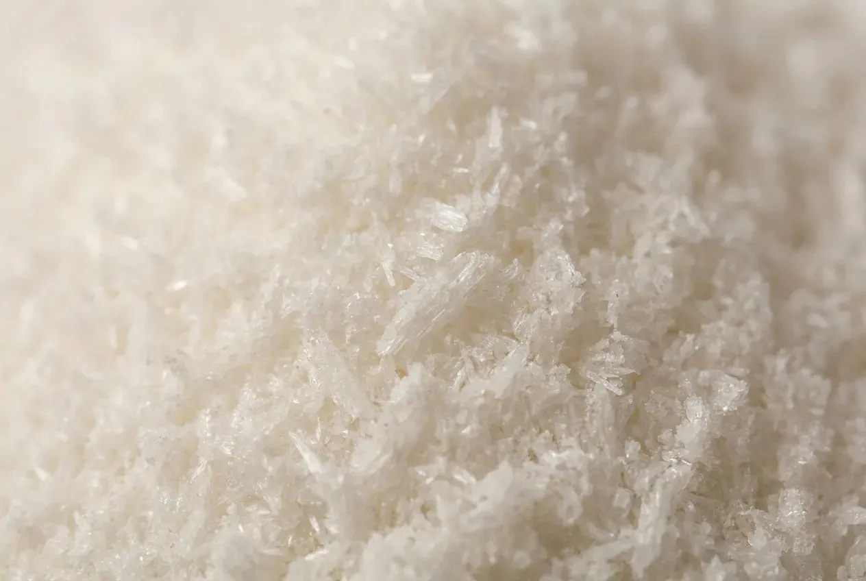 Off-white L-Tyrosine crystalline powder, an ingredient in Magic Scoop Electrolytes + Creatine.