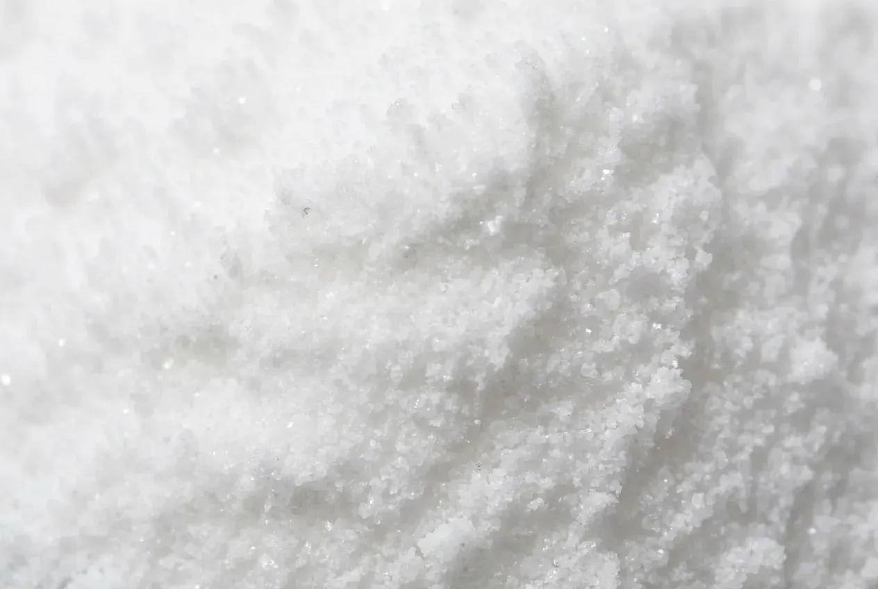 Bright white taurine powder, an ingredient in Magic Scoop Electrolytes + Creatine.